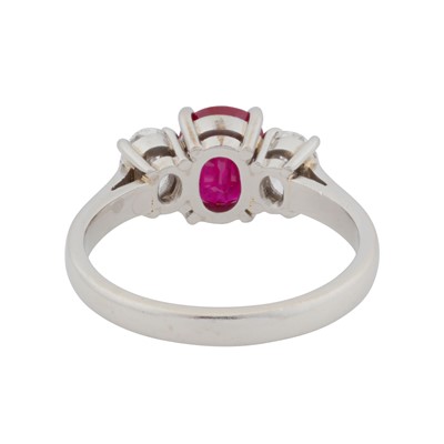 Lot 88 - A three-stone ruby and diamond ring, circa 2007
