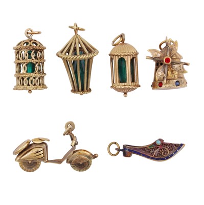 Lot 496 - A collection of five charms, circa 1965