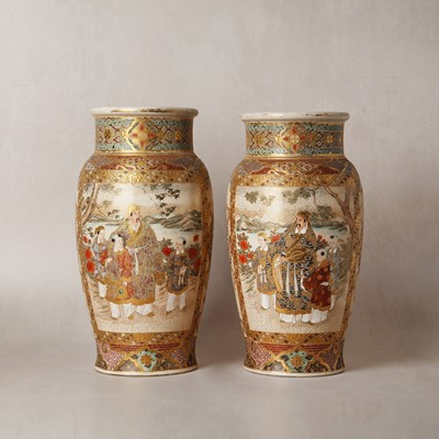 Lot 14 - A pair of Japanese Satsuma 'figural' vases, Meiji period, 19th/20th century