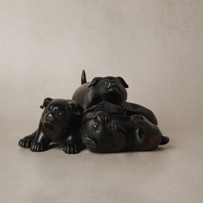 Lot 87 - A Japanese bronze 'puppies playing' okimono, Meiji period, 19th century