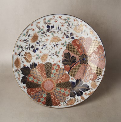 Lot 23 - A large Japanese Arita Imari 'floral medallion' charger, Meiji period, 19th century