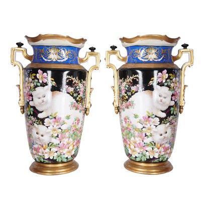 Lot 277 - A pair of French hand painted porcelain twin handled vases
