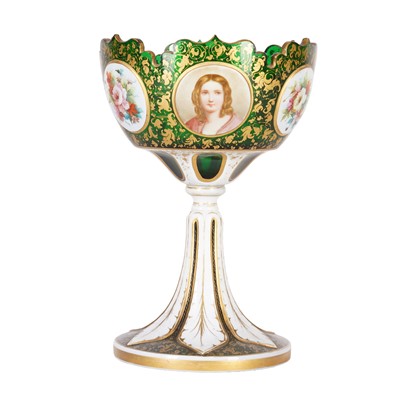 Lot 328 - A Bohemian green glass pedestal bowl, painted with reserves