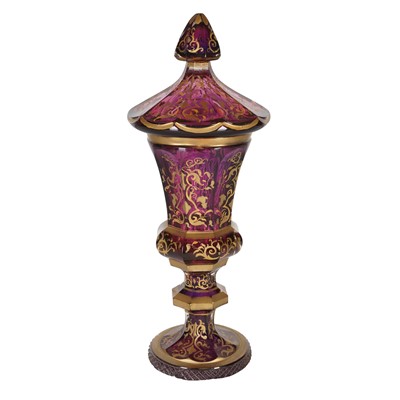 Lot 329 - A Bohemian amethyst glass and parcel gilt goblet and cover