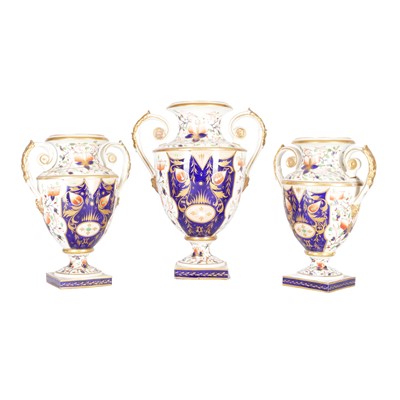 Lot 294 - A Regency garniture set of three Derby Imari twin handled porcelain vases