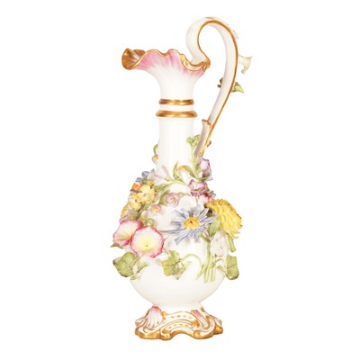 Lot 305 - A Meissen style German flower encrusted porcelain ewer
