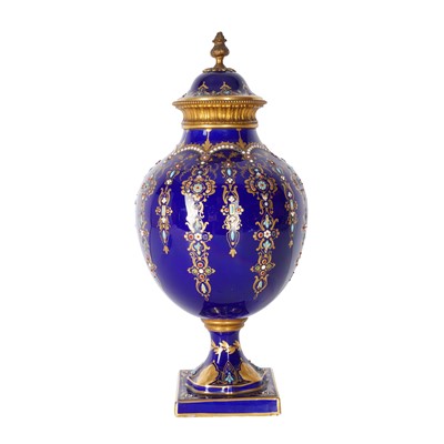 Lot 279 - A French Sèvres-style jewelled cobalt-blue porcelain vase and cover