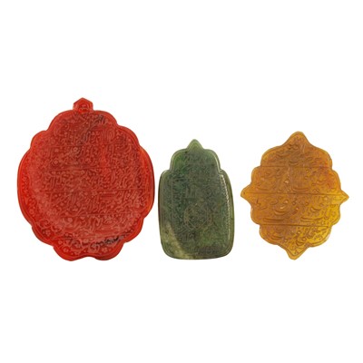 Lot 256 - A Group of Three Hardstone Islamic Inscribed talismanic Amulets