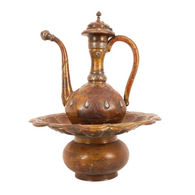 Lot 246 - A Persian or Central Asian Brass Ewer and Basin