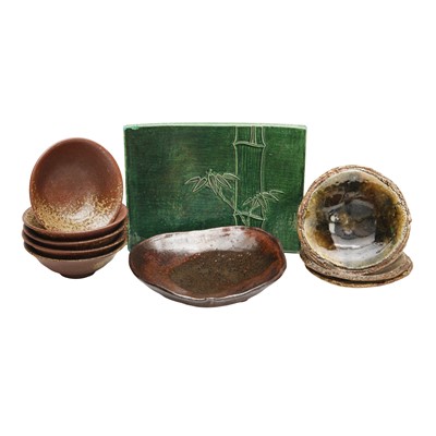 Lot 46 - A group of Japanese stoneware dishes and bowls, 20th/21st century