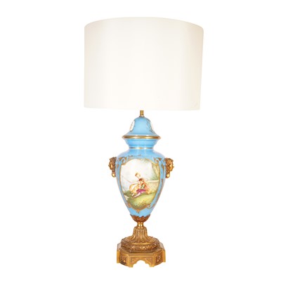 Lot 101 - A Sèvres style bleu céleste porcelain and ormolu-mounted table lamp