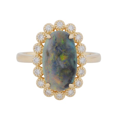 Lot 126 - An opal and diamond halo ring