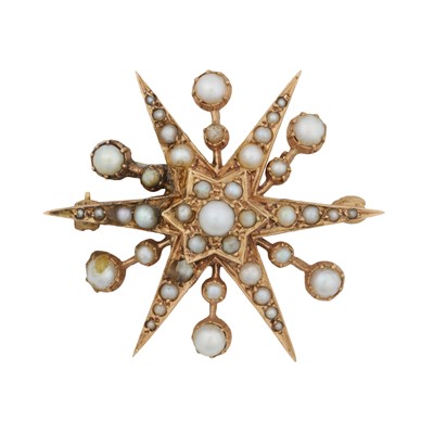 Lot 113 - A seed pearl star brooch