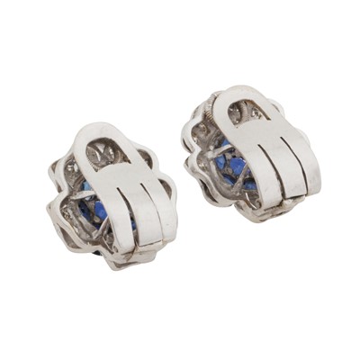 Lot 58 - A pair of sapphire and diamond flower earrings