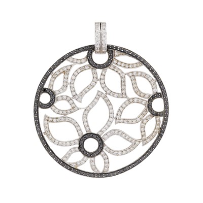 Lot 410 - A black and white diamond floral pendant