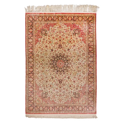 Lot 103 - An extremely fine and signed silk Qum carpet, central Persia