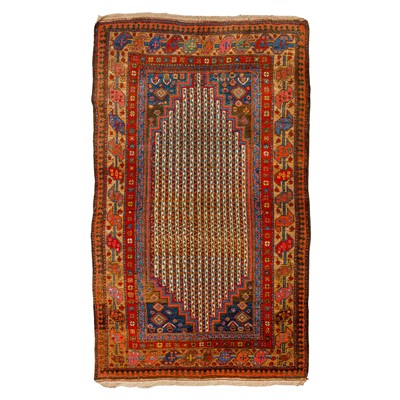 Lot 28 - An antique Kurdish rug