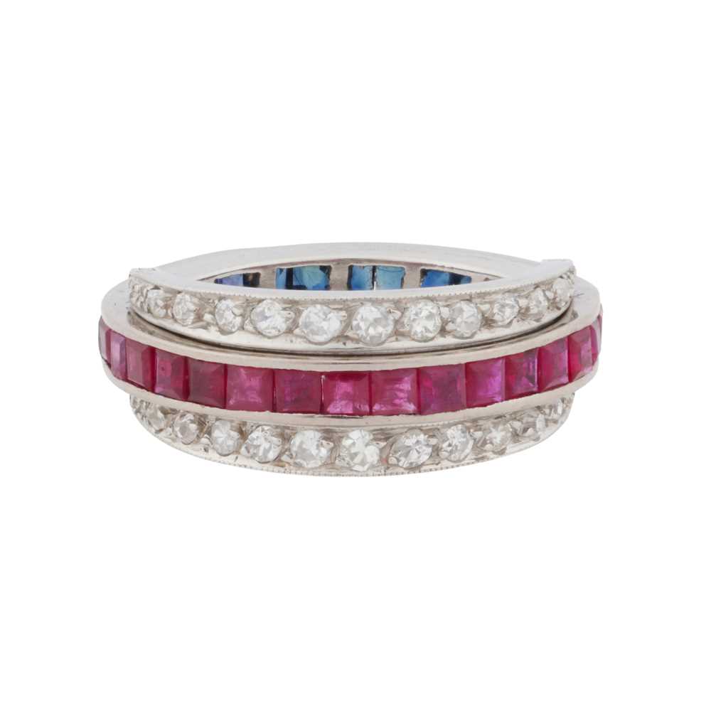 Lot 84 - A gem-set 'day and night' eternity ring