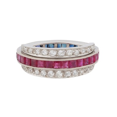 Lot 84 - A gem-set 'day and night' eternity ring
