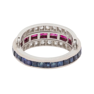 Lot 84 - A gem-set 'day and night' eternity ring