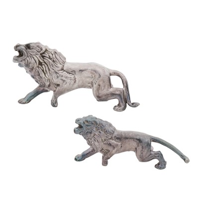 Lot 581 - A pair of late 20th century possibly Italian sterling silver models of lions