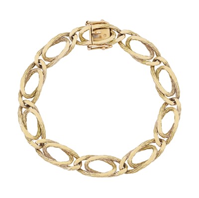 Lot 265 - A fancy curb link bracelet, circa 1978