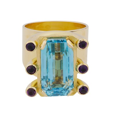 Lot 76 - An aquamarine and amethyst cocktail ring, circa 1983