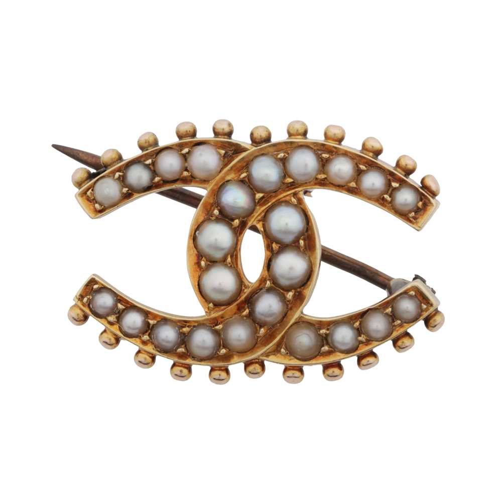 Lot 3 - A Victorian double horseshoe seed pearl brooch
