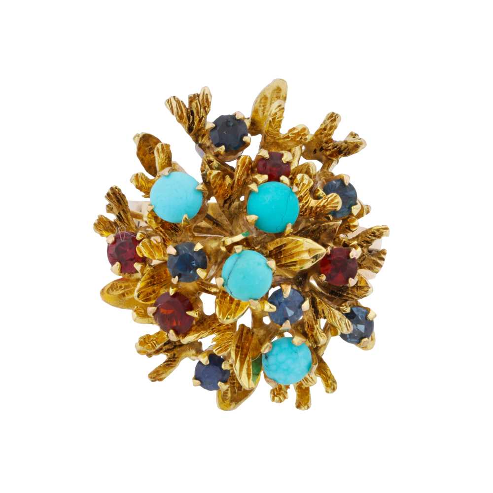 Lot 19 - A sapphire, garnet, and turquoise cocktail ring