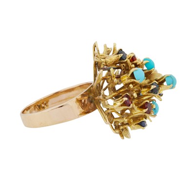 Lot 19 - A sapphire, garnet, and turquoise cocktail ring