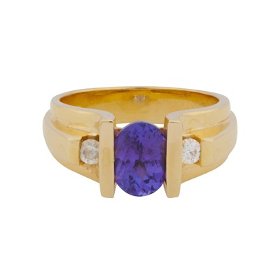 Lot 45 - A tanzanite and diamond three stone ring