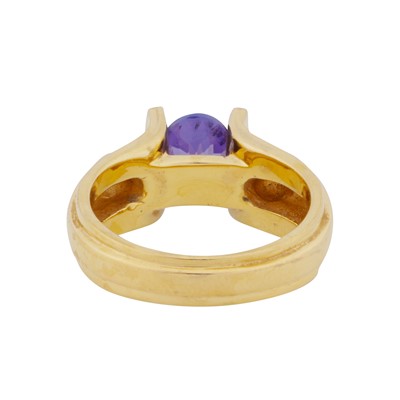 Lot 45 - A tanzanite and diamond three stone ring