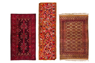 Lot 360 - A group of three rugs, including a hooked stitched runner