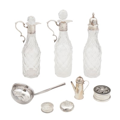 Lot 745 - Three Victorian sterling silver mounted cruet bottles, London 1855 by John Evans