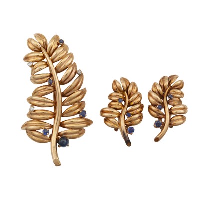 Lot 49 - A sapphire and diamond brooch and earring suite, circa 1955