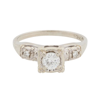 Lot 137 - A diamond three stone ring