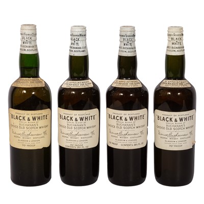 Lot 310 - Black and White Whisky - 4 bottles