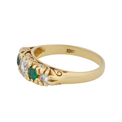 Lot 94 - An emerald and diamond five stone ring
