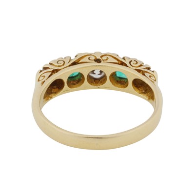 Lot 94 - An emerald and diamond five stone ring