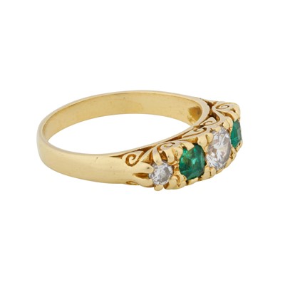Lot 94 - An emerald and diamond five stone ring