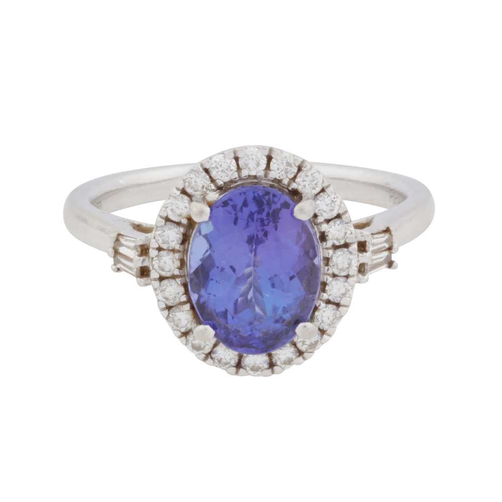 Lot 63 - Rhapsody | A tanzanite and diamond halo ring
