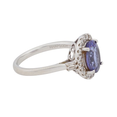 Lot 63 - Rhapsody | A tanzanite and diamond halo ring