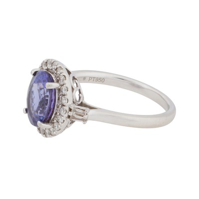Lot 63 - Rhapsody | A tanzanite and diamond halo ring