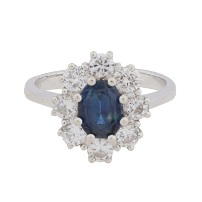 Lot 59 - A sapphire and diamond cluster ring
