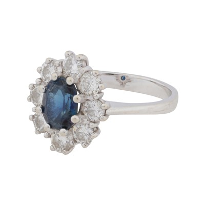Lot 59 - A sapphire and diamond cluster ring