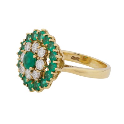 Lot 96 - An emerald and diamond dress ring, circa 1999