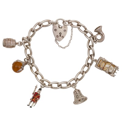 Lot 199 - A charm bracelet, circa 1979