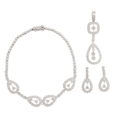 Lot 135 - A white sapphire pendant, bracelet and earring suite