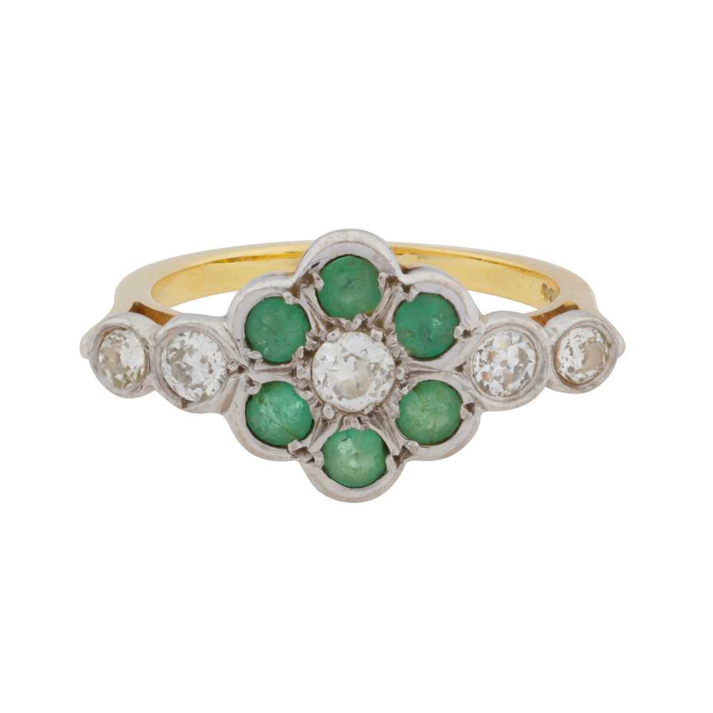 Lot 93 - An emerald and diamond flower ring