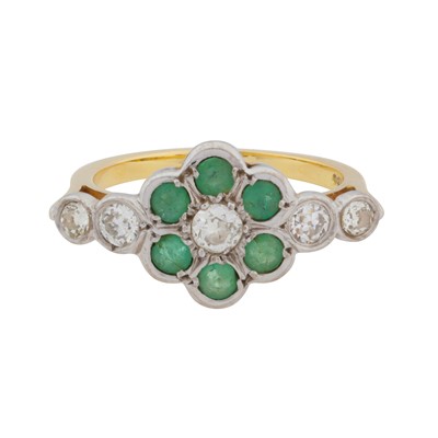 Lot 93 - An emerald and diamond flower ring